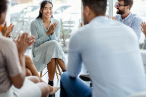 happy in group therapy session