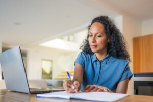 woman studying online from home