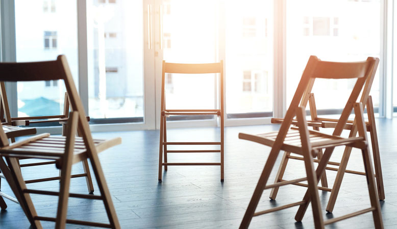 empty chairs in group therapy