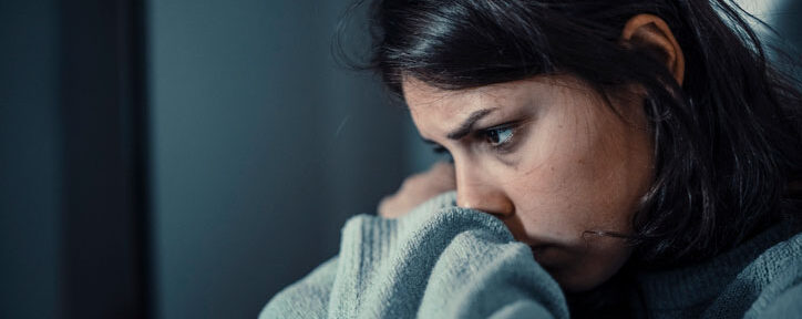 mentally distressed woman alone