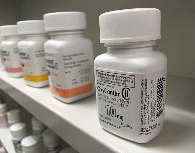 oxy bottle on the pharmacy shelf