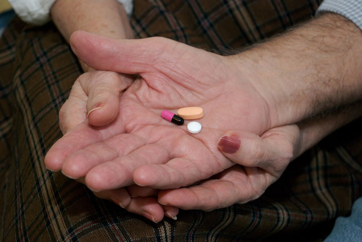 seniors taking prescription pills