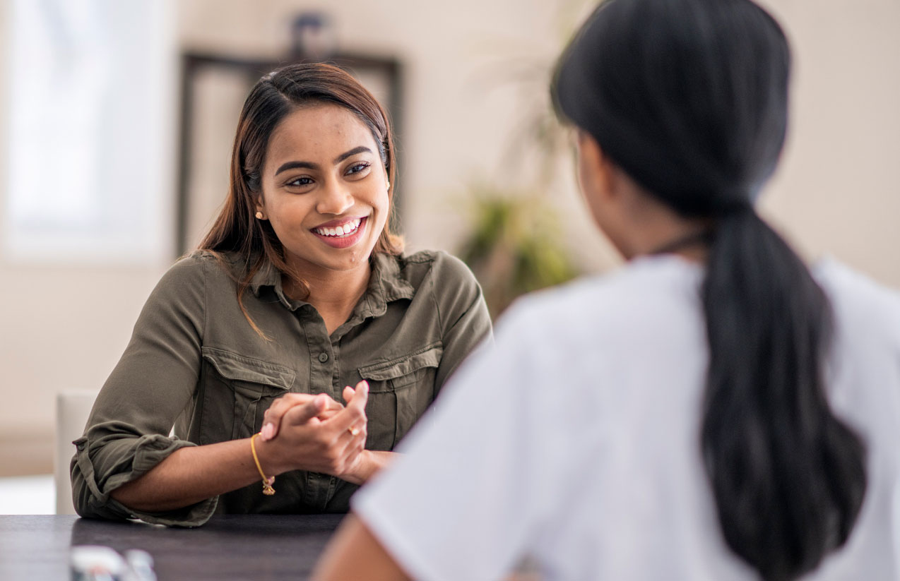 addiction counselor working with patient
